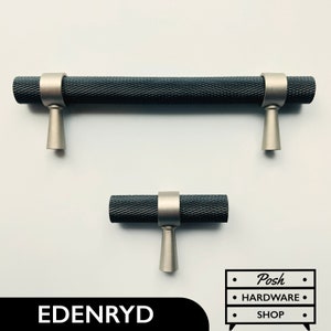 May include: Two black cabinet pulls with a textured finish and a silver metal base. The larger pull is 12.7 cm long and the smaller pull is 7.6 cm long.