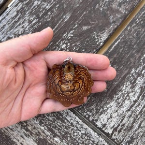 Golden Flower Pinecone Pendant