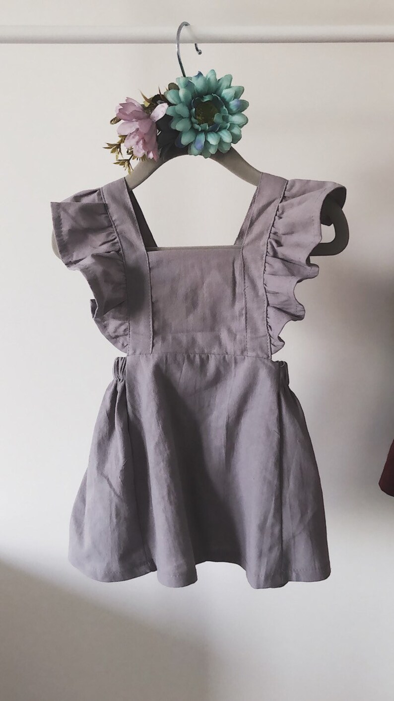 Lovely cotton frill strap baby dress.
