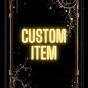 May include: A black background with a gold decorative border and the words "CUSTOM ITEM" in a glowing yellow font. The border features ornate designs, stars, and floral elements, creating a vintage or fantasy aesthetic.