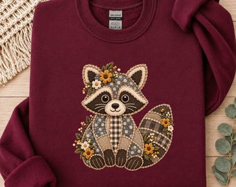 Sweatshirt mit Waschbär-Patchwork-Optik, floralem Cottagecore-Design, Rundhalsausschnitt im Herbstwald-Stil