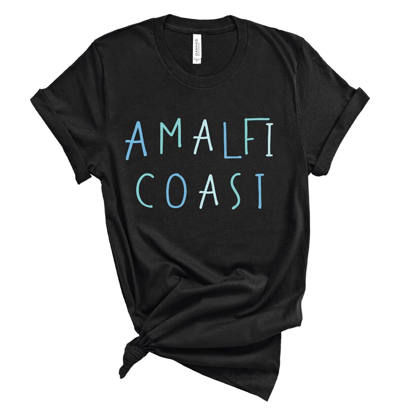May include: Black t-shirt with a blue and white gradient text design that reads "Amalfi Coast".