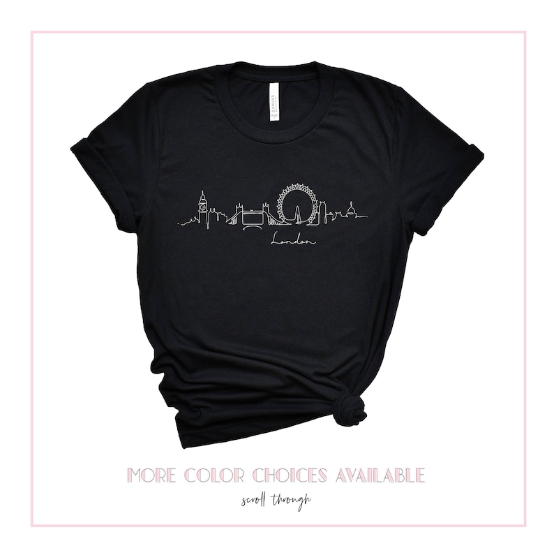 May include: Black t-shirt with a white outline of the London skyline, including Big Ben, the London Eye, and Tower Bridge. The text "London" is written below the skyline.