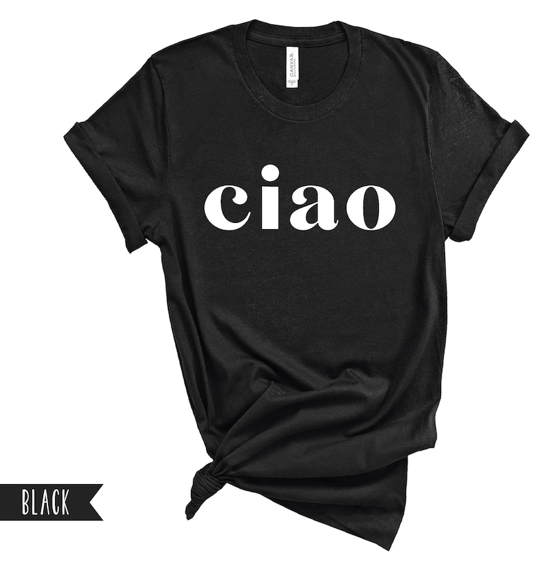 May include: Black t-shirt with the word "ciao" printed in white on the front.