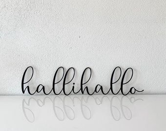 Schriftzug "hallihallo" aus Edelstahl in schwarz pulverbeschichtet