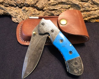 8" Handmade Damascus Folding Pocketknife w/ Damascus Bolster and Blue Resin Handle with Belt Clip and Custom Designed Spine Work