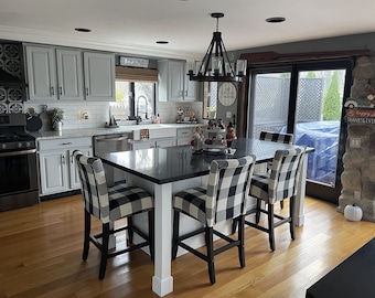 7ft white island with black quartz top. Custom welcome