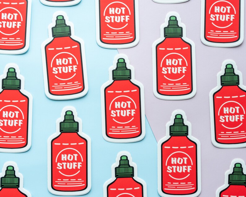 May include: Ten red and white hot sauce bottle stickers with the text "HOT STUFF" in a white circle on each sticker.