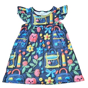Vestido con volantes de seda de leche de regreso a la escuela cosido