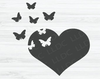 May include: A black silhouette of a heart with butterflies flying out of it. The heart is slightly broken, with a few butterflies flying out of the cracks.