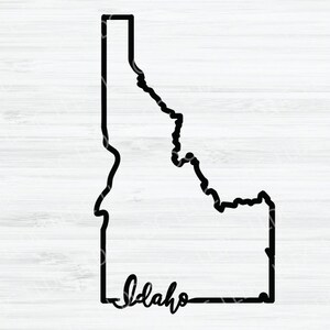 May include: Black and white outline of the state of Idaho with the word "Idaho" written in cursive underneath.