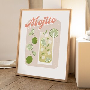 May include: A printable art print featuring a retro-style illustration of a mojito cocktail with lime slices and mint leaves. The text "Mojito" is written in a bold, colorful font.