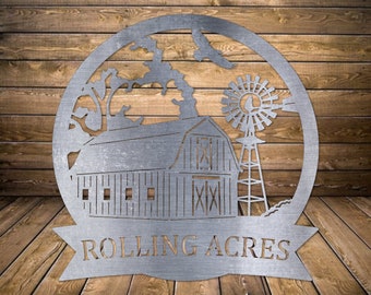 May include: Metal sign with a silhouette of a barn, windmill, and trees. The sign has the text "Rolling Acres" on a banner below the image.