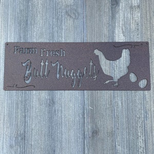 Farm Fresh Butt Nuggets: Humorous Metal Sign with Chicken Laying an Egg – Whimsical Kitchen Decor