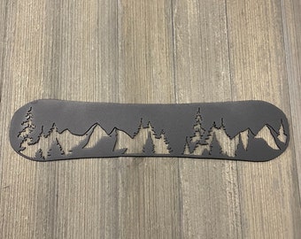 Metal Snowboard with Mountain Treeline Sign And Mountain Silhouette