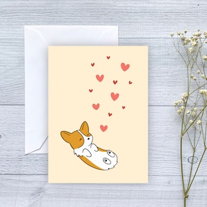 Rolling Corgi Pink Hearts Wenskaart | Gevouwen lege kaart voor verjaardag, verjaardag, Valentijnsdag, lange afstand, vriendschap