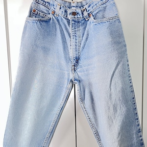vintage Levis jeans 513 28” Waistband W30 tag  High waisted light wash 512