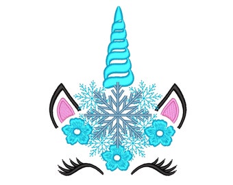 May include: A blue unicorn head with a snowflake and blue flowers. The unicorn has pink ears and black eyelashes.