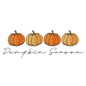 May include: An embroidered design featuring four orange pumpkins with green stems, arranged in a row. Below the pumpkins, the words "Pumpkin Season" are written in a cursive font, all set against a white background.