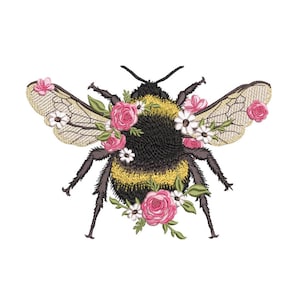May include: Embroidered bumblebee design. The bee has a black, yellow, and brown body, decorated with pink and white flowers and green leaves. The wings have a detailed pattern, set against a white background.
