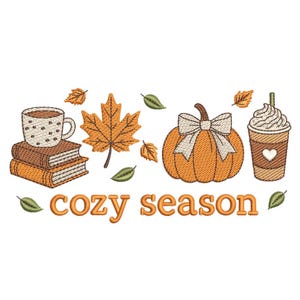 May include: An embroidered design featuring a coffee cup on books, a maple leaf, a pumpkin with a bow, and a coffee drink. The phrase "cozy season" is written in orange script. Autumn-themed design.