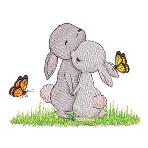 May include: Embroidered design featuring two gray bunnies embracing on a patch of green grass. Two orange and yellow butterflies are also present. The bunnies have pink accents on their ears and paws. The design is on a white background.