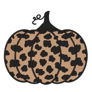 May include: A black and brown leopard print pumpkin with a black stem.