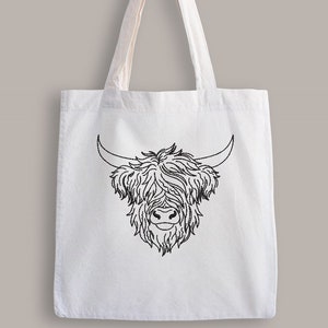 May include: White tote bag with a black line drawing of a Highland cow head.
