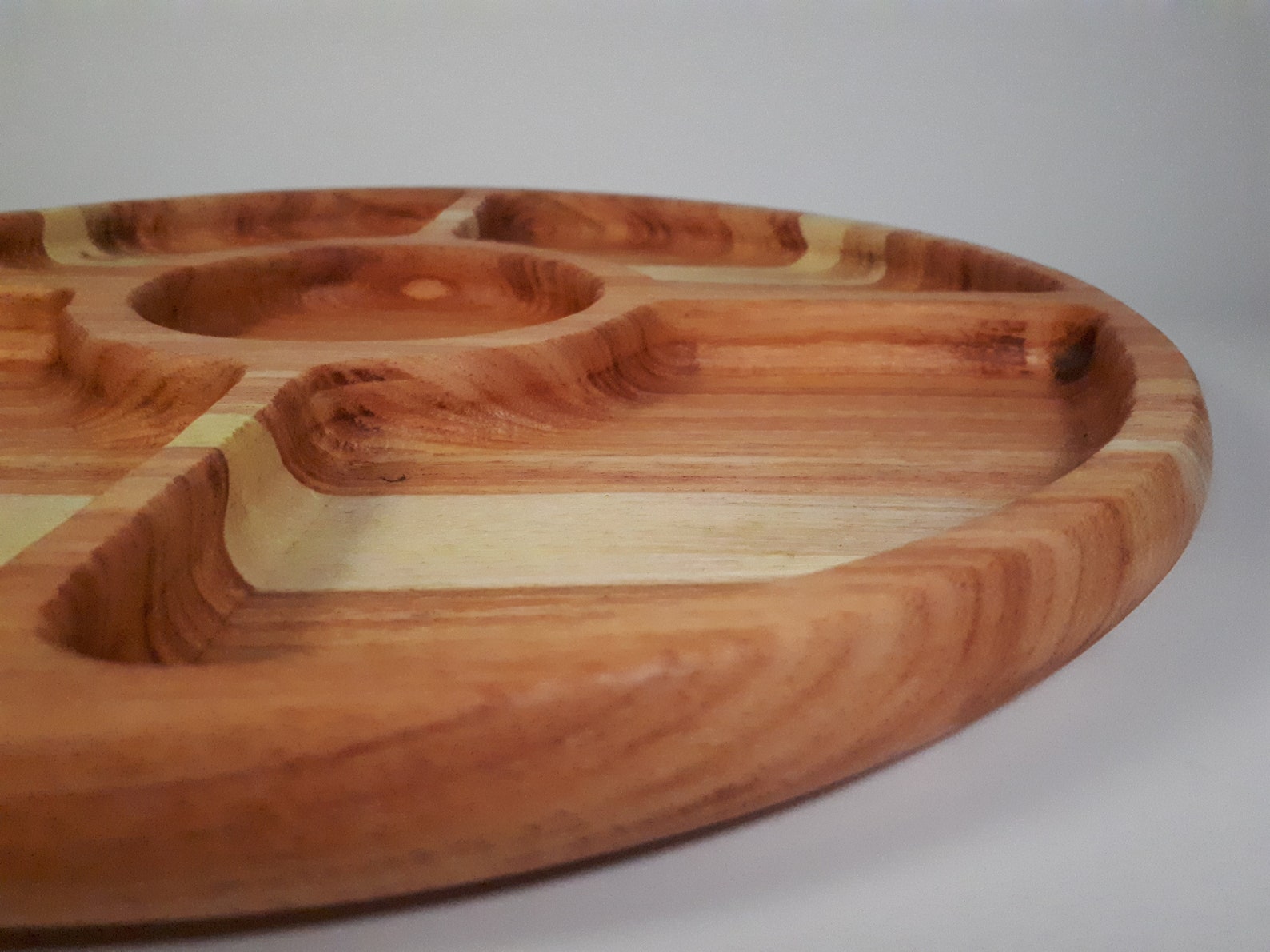 Wooden plate is divided into 5 sections hand carved from Etsy