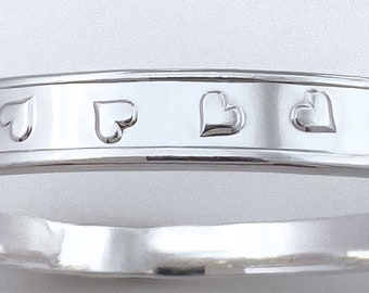 Tumbling Hearts Silver Bangle