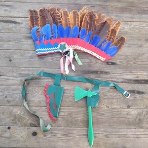 Childhood memories, Childs feather bonnet and Tomahawk, ca 1970s,