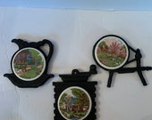 Set Of Three Vintage Currier Ives American Homestead Ceramic And Cast Iron Spinning Wheel, Teapot And Coffee Grinder Trivets Plaques