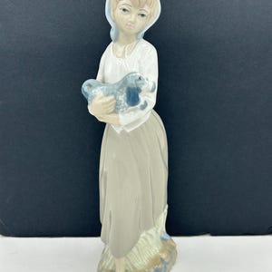 Vintage Casades Porcelanas Made In Spain 10 Inch Young Woman Wearing Scarf Holding Puppy Dog Porcelain Figurine Sculpture