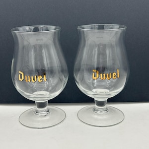 Set Of Two Duvel Moortgat Brewery Belgium Clear Stemmed Tulip Shaped 20 Ounce 6 Inch Chalice Beer Glass Goblets With Duvel Gold Logo Design