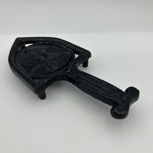 Vintage Heavy Cast Iron Unmarked 9 Inch Trivet Sad Iron Stand Paperweight With George Washington Embossed Bust Portrait And Three Legs
