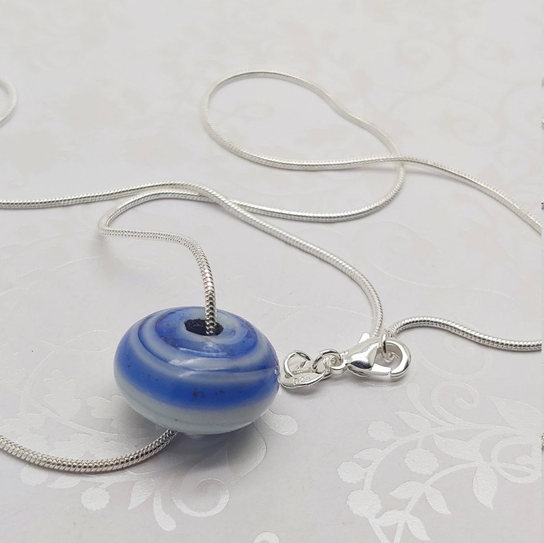 Bijoux by Rose Handcrafted Azure Swirl Ciambella Rose glass pendant on 20 inch silver plate snake chain