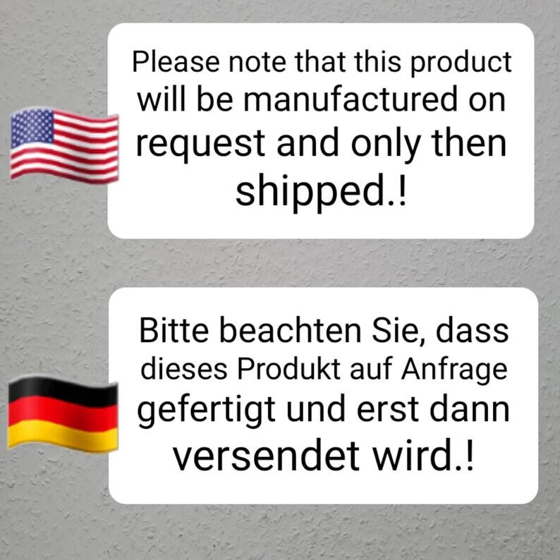 May include: Two white rectangular signs with black text. The top sign features a United States flag icon and the text: Please note that this product will be manufactured on request and only then shipped.! The bottom sign features a German flag icon.