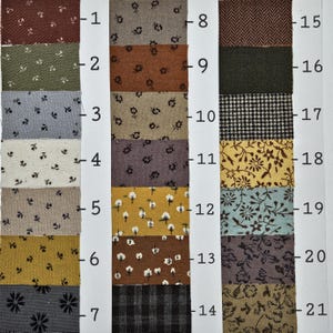 May include: A fabric swatch chart featuring twenty-one numbered samples arranged in three columns. The collection includes various patterns such as floral prints, herringbone, houndstooth, and plaid in colors like brown, olive, blue, yellow, and gray.