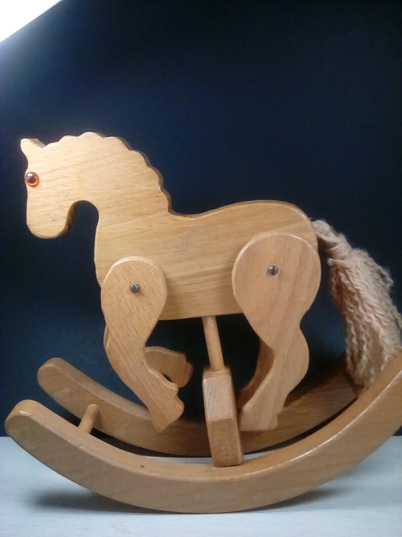 doll on rocking horse