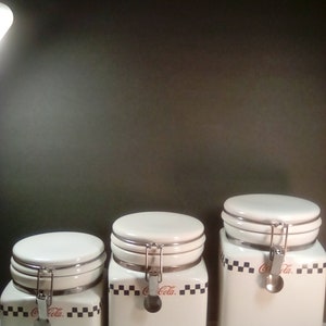 Beautiful Set of 3 Coca Cola canisters