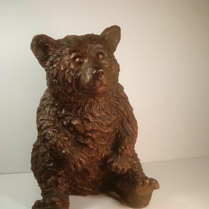 Cute sitting Bear statue
