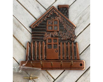 Wieszak na klucze do domu z żeliwa pokrytego miedzią ODI z 1995 r.