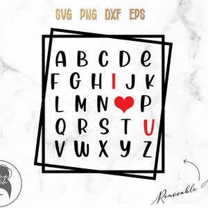 May include: Black and white alphabet letters in a square frame with a red heart replacing the letter "I" and the letter "U" in red. The text "Removable Frame" is written below the square frame.