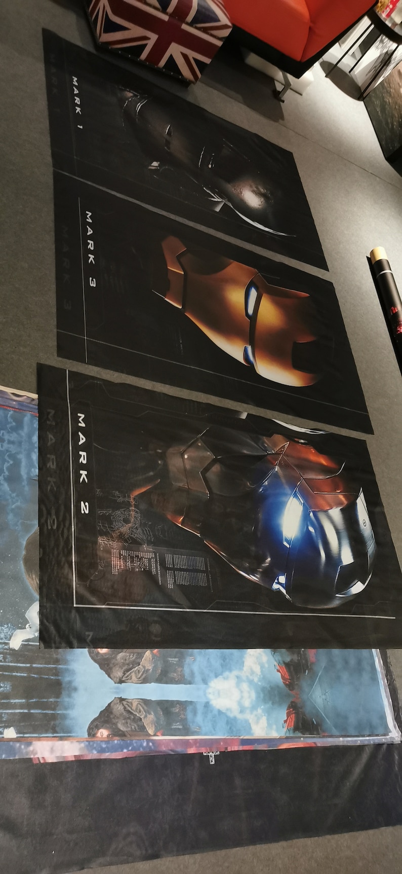 May include: Three black and white posters featuring Iron Man suits. The posters are labeled "Mark 1", "Mark 3", and "Mark 2".