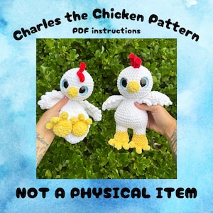May include: Charles the Chicken Pattern PDF instructions. Two white crocheted chickens with yellow feet, yellow beaks, red combs, and large blue eyes. The text reads Charles the Chicken Pattern PDF instructions and NOT A PHYSICAL ITEM.
