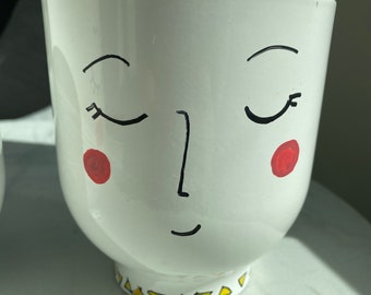 Hand painted people pots