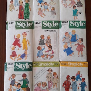 May include: A collection of vintage sewing patterns for babies and toddlers. The patterns feature illustrations of children's clothing, including dresses, overalls, and jackets. The patterns are from Simplicity and Style.