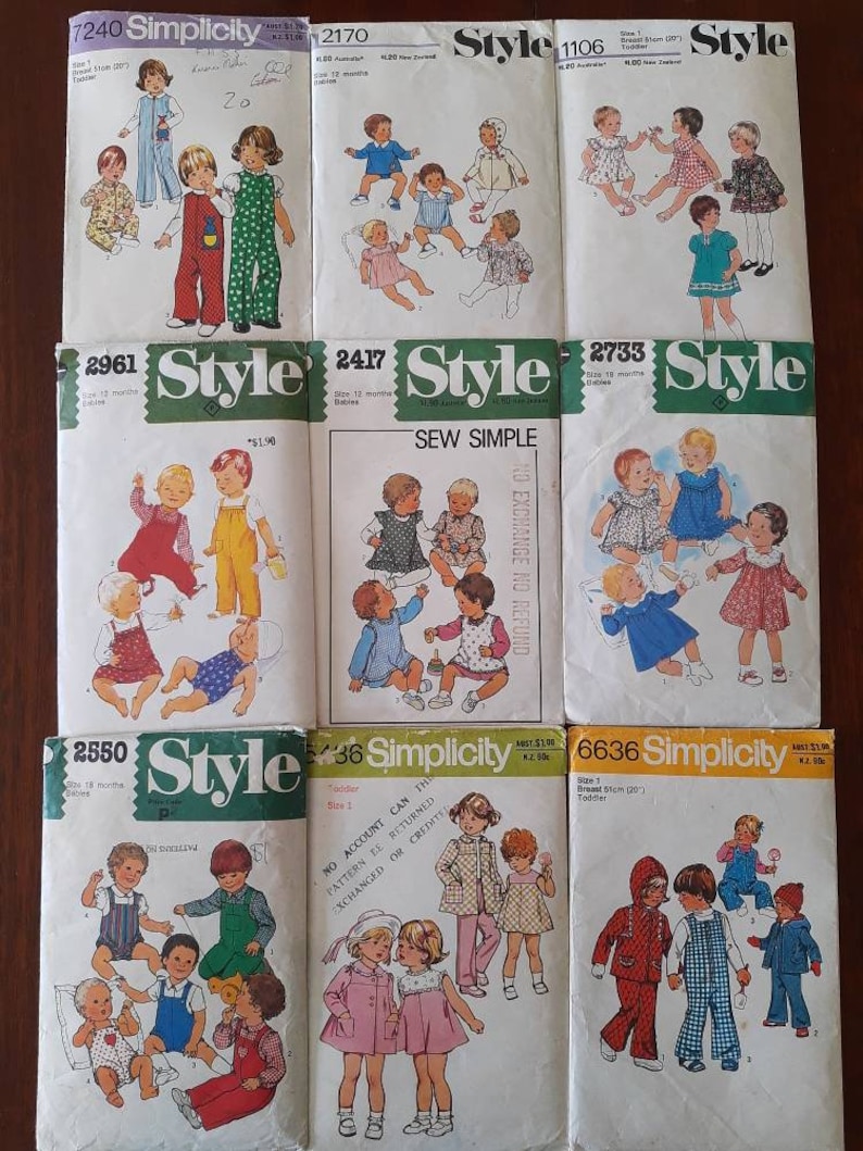 May include: A collection of vintage sewing patterns for babies and toddlers. The patterns feature illustrations of children's clothing, including dresses, overalls, and jackets. The patterns are from Simplicity and Style.