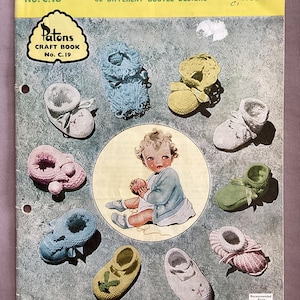 May include: A vintage Patons craft book No. C.19 titled Patons Bootee Book, featuring Bonnets and 32 DIFFERENT BOOTEE DESIGNS. The cover displays an illustration of a baby surrounded by nine various knitted baby booties in colors like blue, yellow, pink, green, and white.
