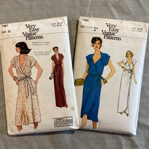 May include: Two vintage Vogue Patterns, featuring illustrations of wrap dresses. One pattern is size B, the other is size 12 (bust 87cm). The text "Very Easy Vogue Patterns" is printed on the front of each package.